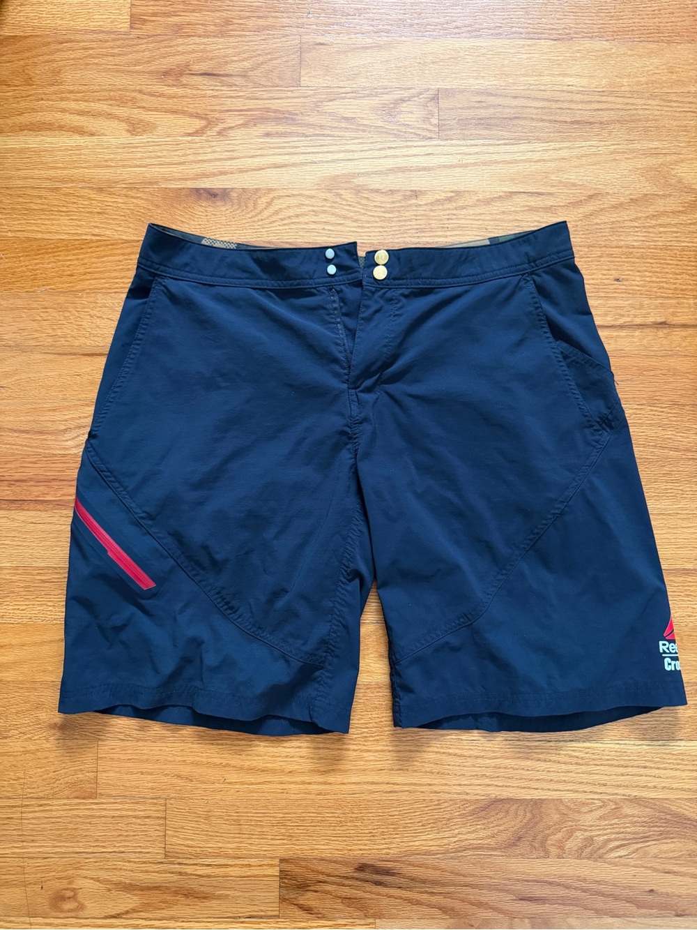 Reebok Men’s Navy Coaching Shorts with Red Trim